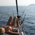 Halkidiki sailing - relaxing on deck near kelyfos island