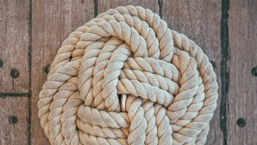 beige rope on brown surface