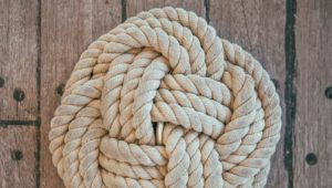 beige rope on brown surface